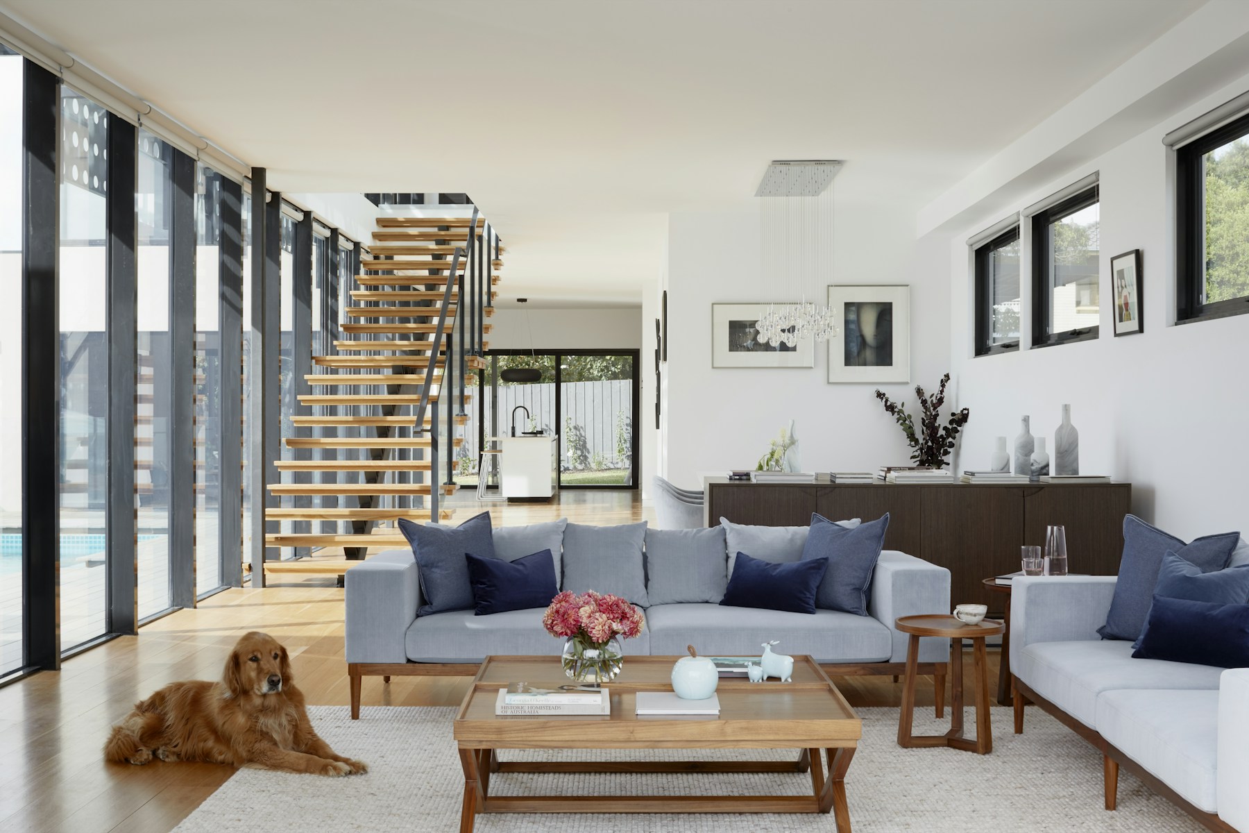 Bright contemporary living room with large windows